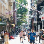 people walking in a busy street