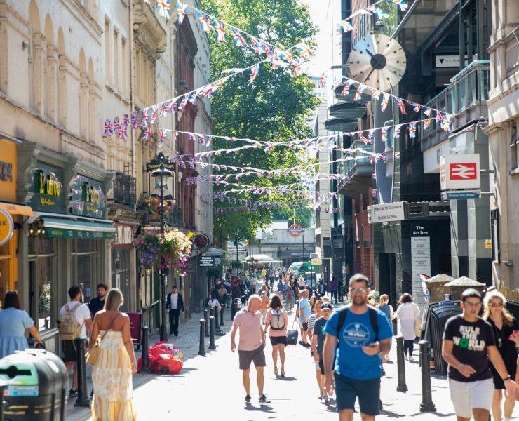 people walking in a busy street