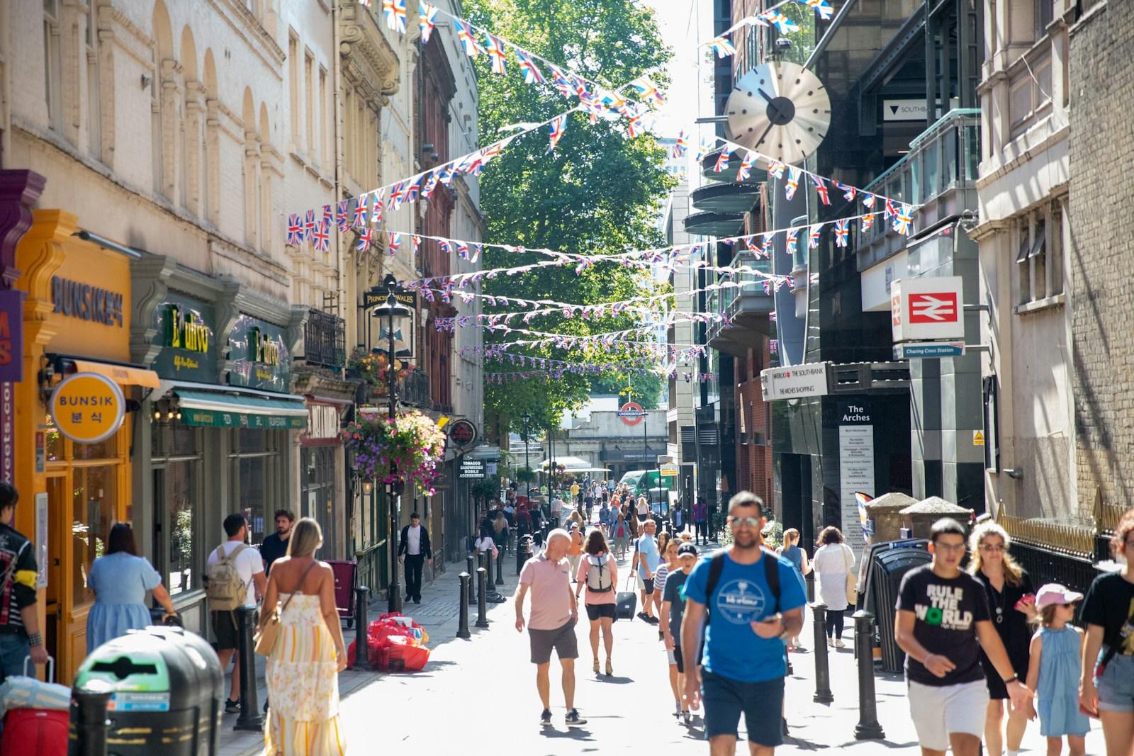 people walking in a busy street