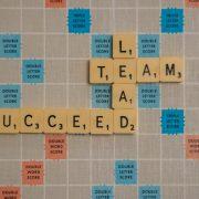 scrabbled scrabble tiles with words on them