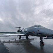 a jet sitting on top of an airport tarmac