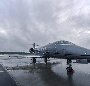 a jet sitting on top of an airport tarmac