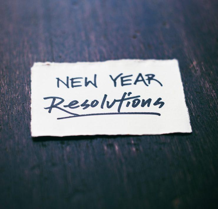 white printer paper on black wooden table