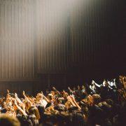 people raising their hands