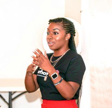 woman in black and red crew neck t-shirt