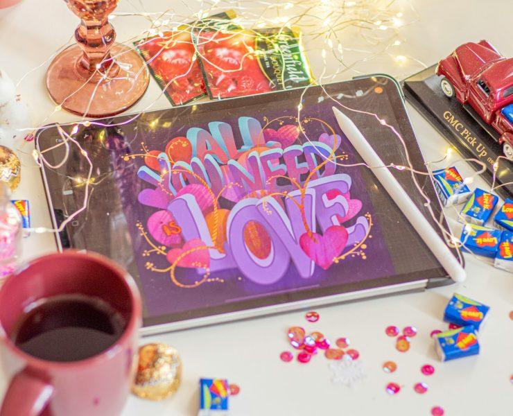 pink and white ceramic mug beside clear glass tray