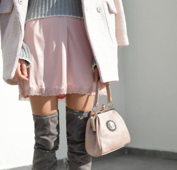 women's pink skirt and gray knee boots outfit
