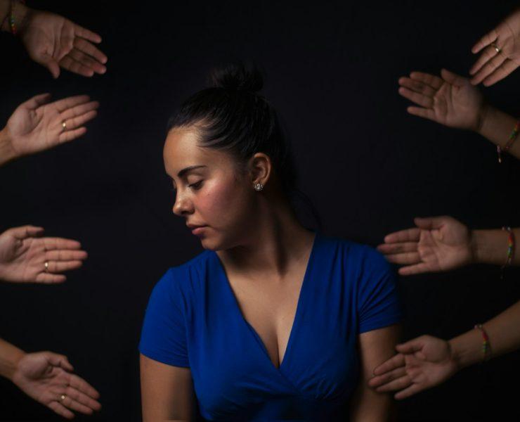 woman wearing blue V-neck short-sleeved top