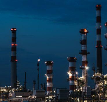 red and white tower under blue sky during night time