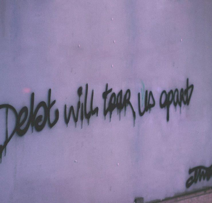 debt will tear us apart wall decor