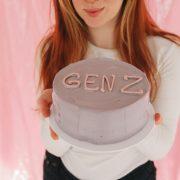 Person Holding a Minimalist Cake