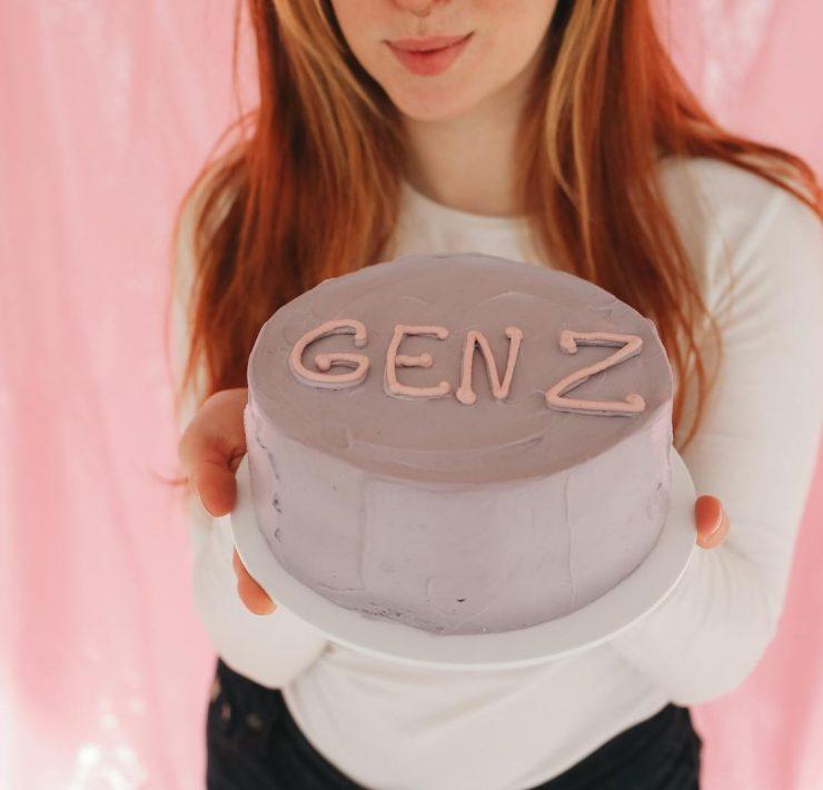 Person Holding a Minimalist Cake