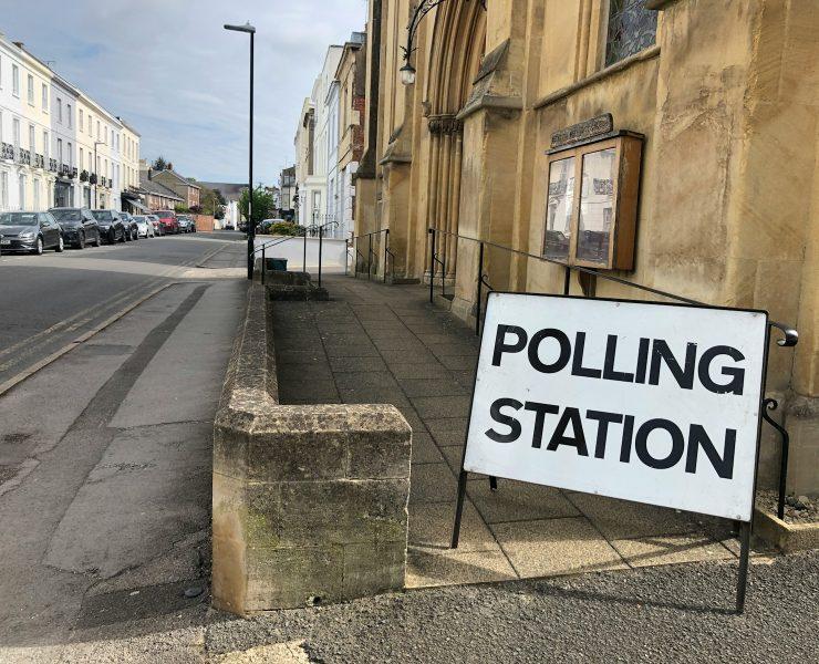 a sign on the side of a road